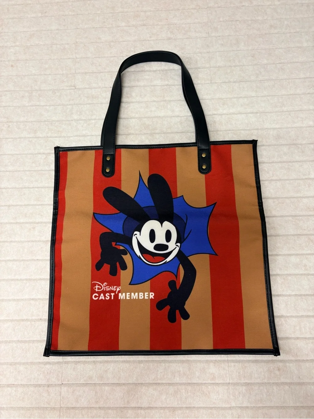 Disney Oswald Stripe Messenger Tote in Brown, Red & Black